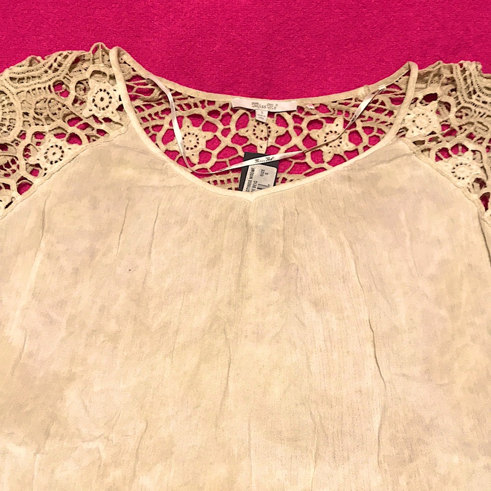 Miss me color taupe being size s , with beautiful crochet in the back